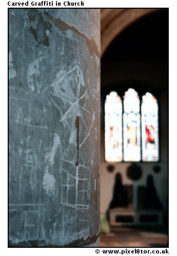 Carved grafitti in church